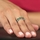 Nina's Silvertone Eternity Ring - Green CZ