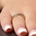 Kee's Goldtone Eternity Ring - Blue CZ