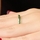 Kee's Goldtone Eternity Ring - Green CZ