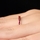 Kee's Goldtone Eternity Ring- Red CZ