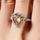 Abilene's 2.5 ct Trillion Cut Champagne CZ Engagement Ring